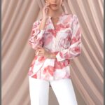 Blusa estampada com pormenor de bolsos